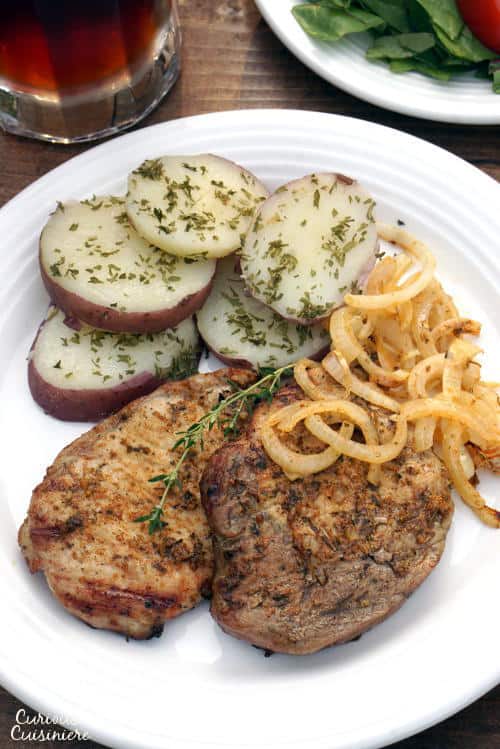 In western Germany you find a fun grilling tradition known as 'Schwenker'. These juicy, smoky grilled German pork chops are cooked on a swinging grill! | www.CuriousCuisiniere.com