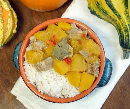 This creamy, Thai Pumpkin Curry recipe brings the comforting flavors of fall into one easy meal, perfect for a weeknight dinner. | www.CuriousCuisiniere.com