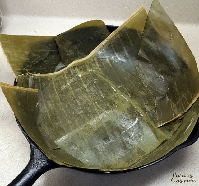 Bibingka is a sweet coconut milk cake that is naturally gluten free! This fluffy Filipino cake uses rice flour to give it a unique texture and delicious flavor! | www.CuriousCuisiniere.com