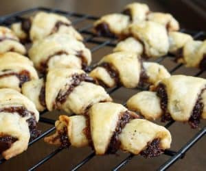 Our Chocolate Raspberry Rugelach and Cinnamon Walnut Rugelach bring a simple pastry dough and crave-worthy fillings together to create irresistible cookies. | www.CuriousCuisiniere.com