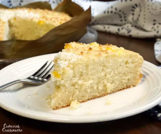 Bibingka is a sweet coconut milk cake that is naturally gluten free! This fluffy Filipino cake uses rice flour to give it a unique texture and delicious flavor! | www.CuriousCuisiniere.com