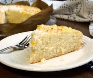 Bibingka is a sweet coconut milk cake that is naturally gluten free! This fluffy Filipino cake uses rice flour to give it a unique texture and delicious flavor! | www.CuriousCuisiniere.com