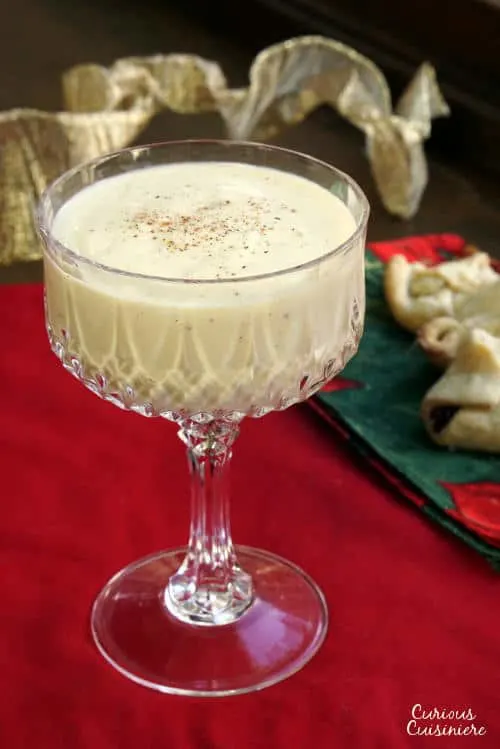 This recipe for Homemade Cooked Eggnog can be served with alcohol or non alcoholic, making it the perfect Holiday drink for everyone! | www.CuriousCuisiniere.com