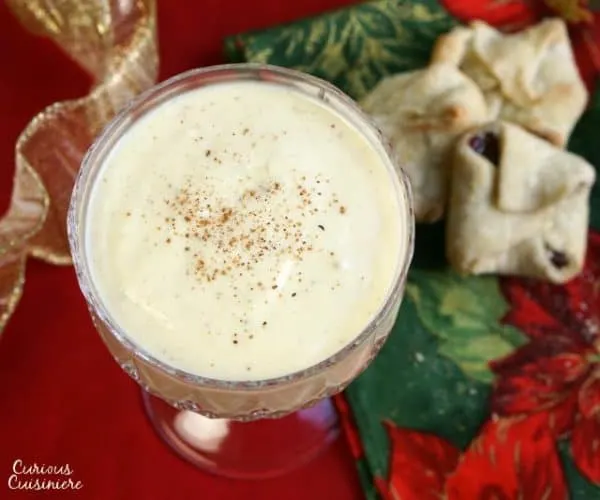 This recipe for Homemade Cooked Eggnog can be served with alcohol or non alcoholic, making it the perfect Holiday drink for everyone! | www.CuriousCuisiniere.com