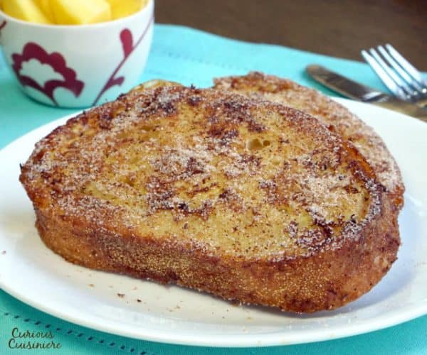 Crispy and cinnamony on the outside and custard-like on the inside, Rabanada, Brazilian French Toast is the perfect breakfast treat or desert at Christmas or any time of year! | www.CuriousCuisiniere.com
