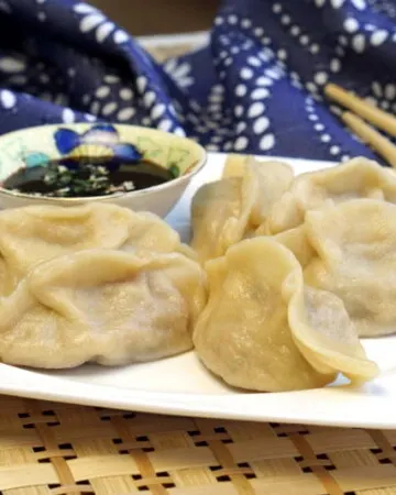 We break down the differences between the different types of Asian dumplings and share our favorite recipe for Vegetable Chinese Dumplings! | www.CuriousCuisiniere.com