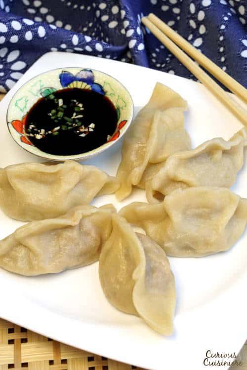 We break down the differences between the different types of Asian dumplings and share our favorite recipe for Vegetable Chinese Dumplings! | www.CuriousCuisiniere.com