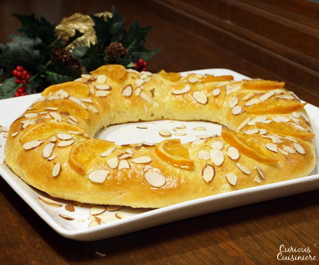 Rosca de Reyes is a soft, lightly sweet, orange scented bread that is traditionally eaten with a cup of hot chocolate on the Feast of the Epiphany. | www.CuriousCuisiniere.com