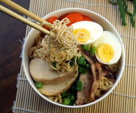 Nutritious, delicious, homemade Ramen soup is made SUPER EASY in your slow cooker! You don't want to miss this easy and versatile weeknight dinner recipe! | www.CuriousCuisiniere.com