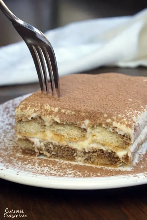 There are many ways to make Italian Tiramisu, but our authentic Tiramisu recipe might surprise you with its light texture and how simple it is to make! | www.CuriousCuisiniere.com