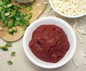 Don't reach for that jar! Our Easy Pizza Sauce Recipe is is only recipe you need to make super-tasty homemade pizza sauce! | www.CuriousCuisiniere.com