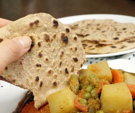 This one recipe will let you make Indian Roti, Chapati, and Puri. Get ready to learn how easy and fun it is to make Indian flatbread! | www.CuriousCuisiniere.com