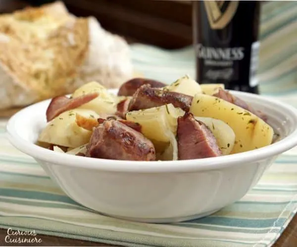 Slow cooker Dublin coddle recipe with sausage, bacon, sausage and potatoes.