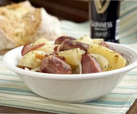 If you're looking for serious comfort food, look no further than Dublin Coddle. This dish of slow cooked bacon, sausage, and potatoes is like a warm blanket on a cold winter day. | www.CuriousCuisiniere.com