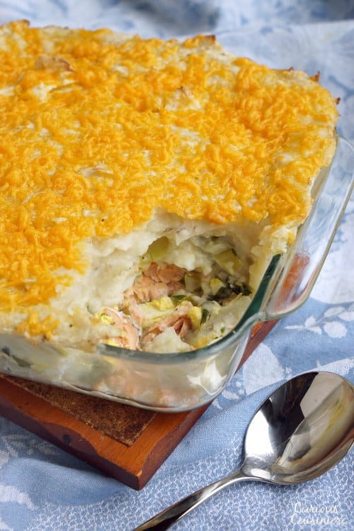 Full of chunky seafood and topped with cheddar cheese, British Fish Pie is unlike any fish pie you have ever encountered. | www.CuriousCuisiniere.com 