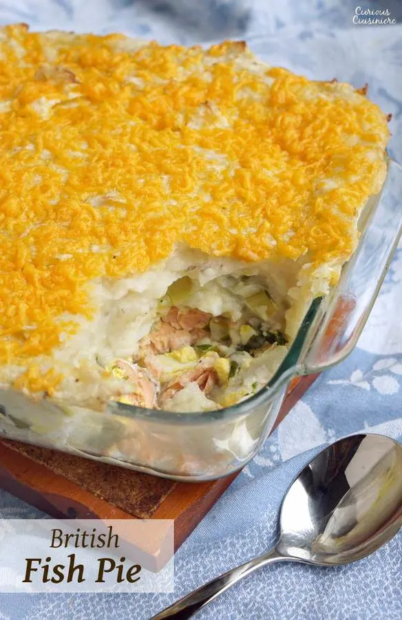 Full of chunky seafood and topped with cheddar cheese, British Fish Pie is unlike any fish pie you have ever encountered. | www.CuriousCuisiniere.com