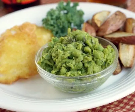 A classic British side dish, Mushy Peas really do bring a whole new dimension to those plain old peas. | www.CuriousCuisiniere.com
