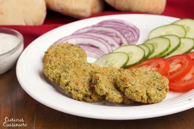 Baked Falafel gives you all the healthy, nutty falafel goodness without the hassle or added fat of frying, and it's just as good for stuffing into a pita! | www.CuriousCuisiniere.com