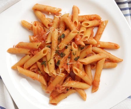 Nothing beats the flavor of homemade Vodka Sauce in this Penne alla Vodka recipe. | www.CuriousCuisiniere.com
