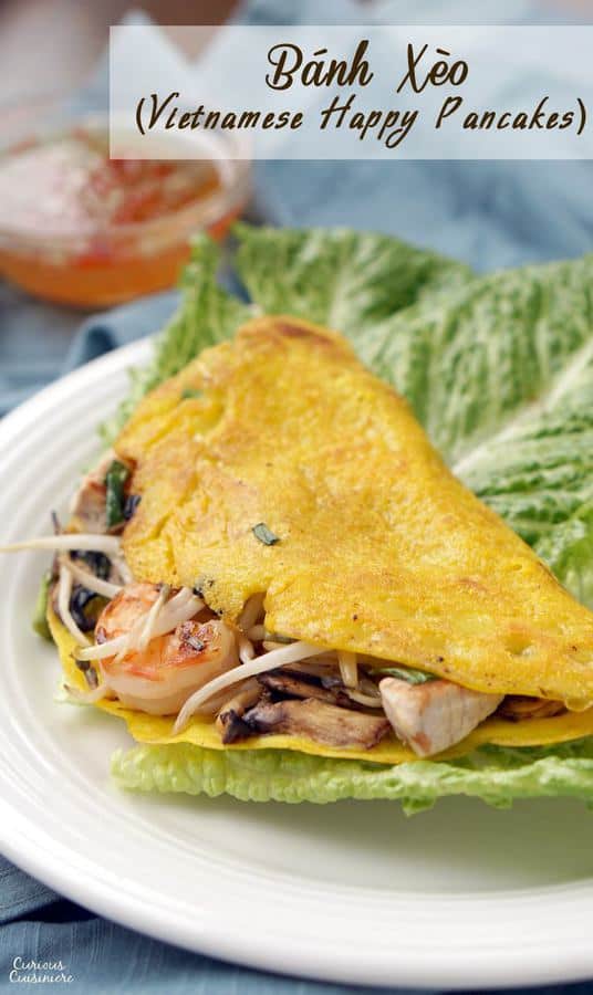 Bánh xèo, or Vietnamese Happy Pancakes, are crepe-like rice flour pancakes that bring a light batter and ample fillings together for one tasty, crispy breakfast or snack! | www.CuriousCuisiniere.com 