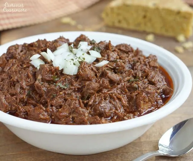 Thick and hearty Cowboy Chili, also known as Texas Red Chili, is sure to stick to your ribs and satisfy any meat lover. | www.CuriousCuisiniere.com