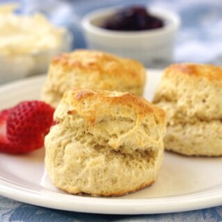 An authentic British Scone is the perfect accompaniment to your warming cup of tea, particularly if you have some clotted cream and jam to serve it with! | www.CuriousCuisiniere.com