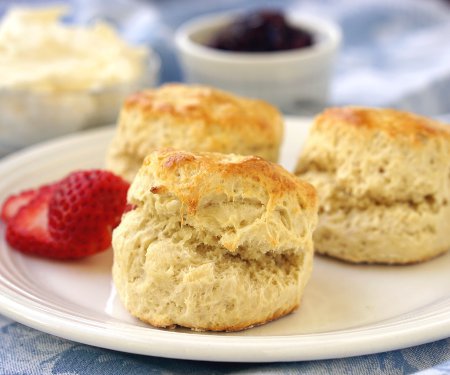 An authentic British Scone is the perfect accompaniment to your warming cup of tea, particularly if you have some clotted cream and jam to serve it with! | www.CuriousCuisiniere.com