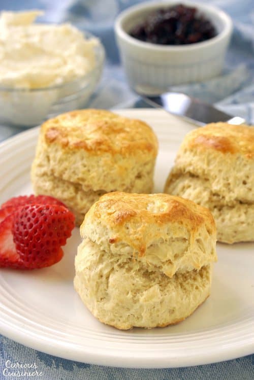 An authentic British Scone is the perfect accompaniment to your warming cup of tea, particularly if you have some clotted cream and jam to serve it with! | www.CuriousCuisiniere.com 