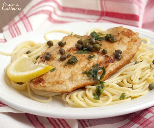 Lemon Chicken Piccata is an easy and flavorful dish that is the perfect recipe for a quick weeknight dinner. | www.CuriousCuisiniere.com 