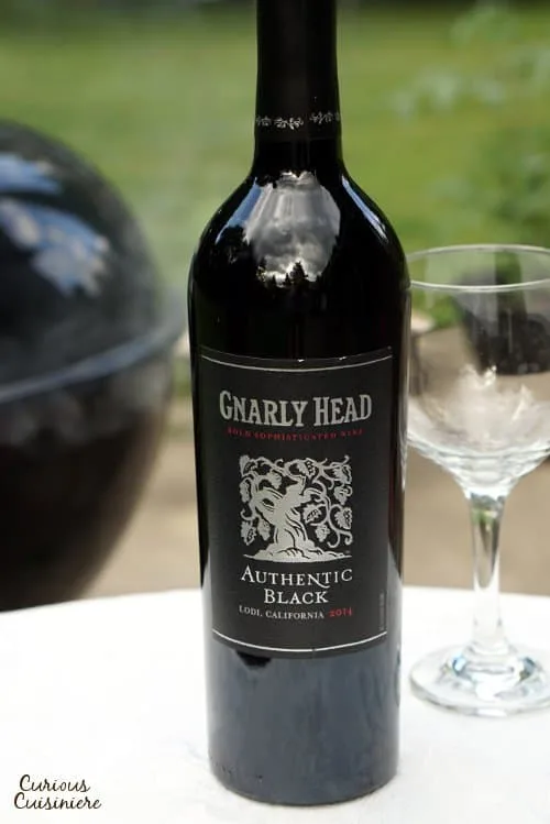 If you're looking for the perfect wine to pair with summer grilled and smoked meats, look no further than the dark and juicy Authentic Black wine from Gnarly Head! | www.CuriousCuisiniere.com 