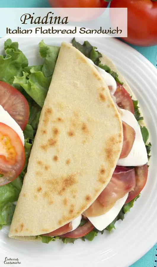 Piadina is a thin, Italian flatbread that is made my street vendors and sold sandwich-style loaded with tasty fillings like fresh mozzarella and flavorful prosciutto. | www.CuriousCuisiniere.com