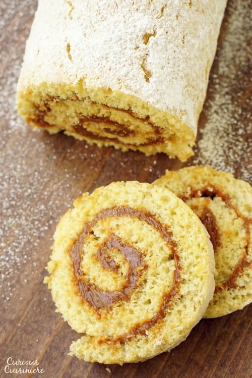 Chilean Brazo de Reina is a simple rolled Dulce de Leche Cake that brings a soft sponge cake together with creamy milk caramel filling for one addicting treat!  | www.CuriousCuisiniere.com