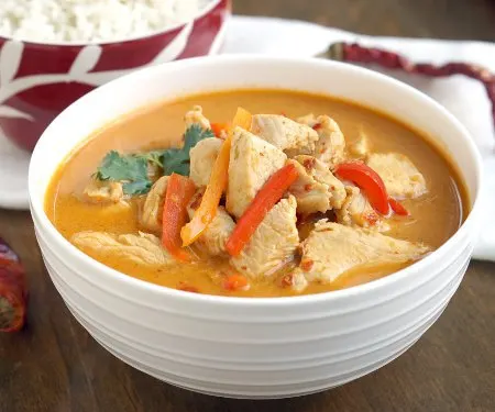 Thai Red Curry is a creamy and flavorful curry that is incredibly versatile and easy to make. It's the perfect weeknight dinner! | www.CuriousCuisiniere.com
