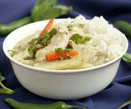 Thai Green Curry is a spicy curry with a unique, herbal flavor. It is an easy curry that is perfect for a weeknight dinner! | www.CuriousCuisiniere.com