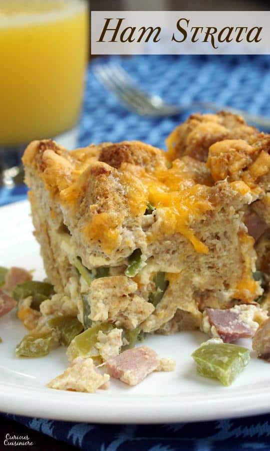 Leftover holiday ham becomes a delicious breakfast or brunch dish in this hearty Ham Strata. | www.curiouscuisiniere.com