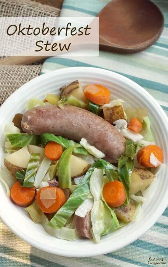 Bratwurst, potatoes, cabbage, and carrots mingle in this hearty Slow Cooker Oktoberfest Stew that gets an extra pump of flavor from a good dose of German beer. | www.CuriousCuisiniere.com