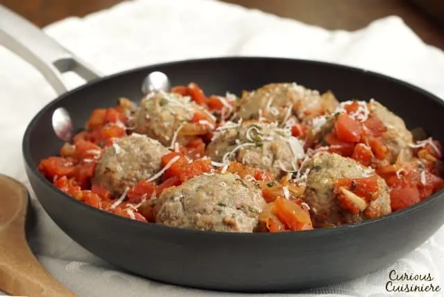 Polpette alla Napoletana are Italian meatballs in a simple tomato sauce, and they're the closest recipe you'll find to "spaghetti with meatballs" in traditional Italian cuisine. | CuriousCuisiniere.com