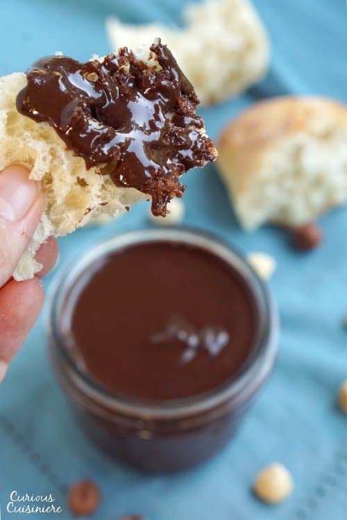 It may surprise you how easy it is to make Homemade Nutella. It's so quick and simple, we bet you'll be adding this Chocolate Hazelnut Spread to everything! | www.CuriousCuisiniere.com