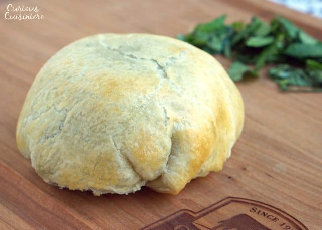 Individual Beef Wellington are an easy way to bring an over the top, classy feel to any special dinner. Our recipe pairs perfectly with a glass of smooth Merlot wine. | www.CuriousCuisiniere.com