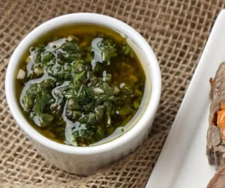 Argentinian Chimichurri perfect for pairing with grilled meats or dipping bread. | www.CuriousCuisiniere.com