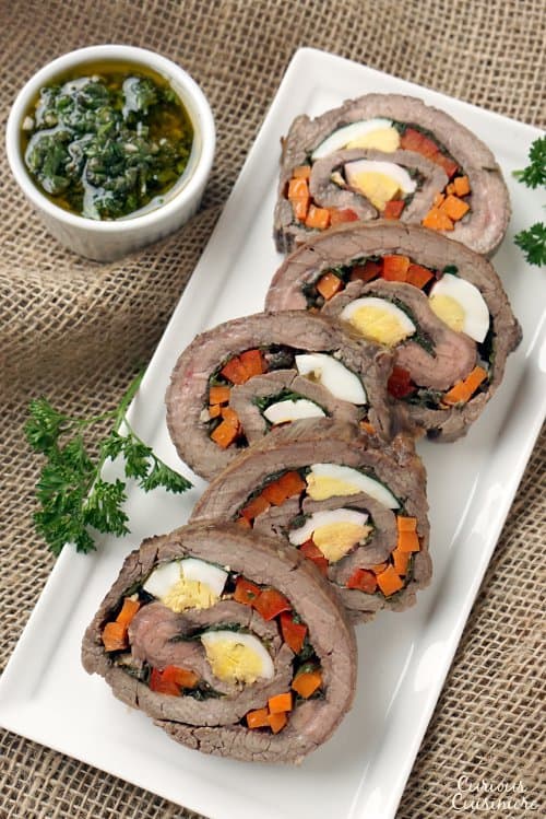 Matambre Arrollado is a flavorful Argentinian Stuffed Flank Steak that makes a unique and beautiful main dish or appetizer. | www.CuriousCuisiniere.com