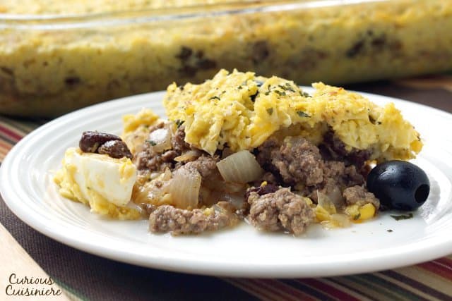 Pastel de Choclo is a beef and corn casserole that brings classic Chilean flavors together with sweetcorn and hearty beef for one satisfying dinner recipe.  | www.CuriousCuisiniere.com