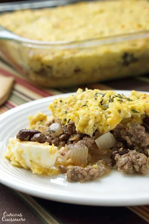 Pastel de Choclo is a comforting recipe for a Chilean beef and corn casserole. With a wonderful combination of flavors and classic South American ingredients, it is the perfect dinner dish for fall and beyond. &nbsp; | www.CuriousCuisiniere.com