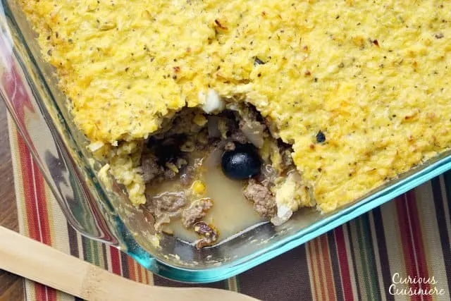Pastel de Choclo is a comforting recipe for a Chilean beef and corn casserole. With a wonderful combination of flavors and classic South American ingredients, it is the perfect dinner dish for fall and beyond.   | www.CuriousCuisiniere.com