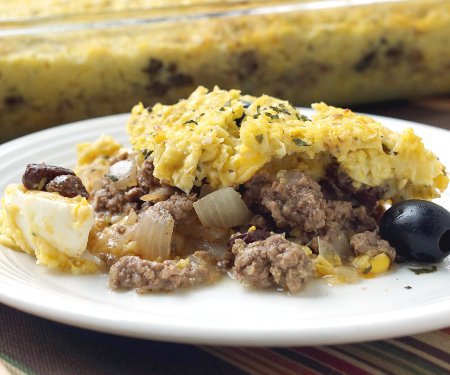 Pastel de Choclo is a beef and corn casserole that brings classic Chilean flavors together with sweetcorn and hearty beef for one satisfying dinner recipe.  | www.CuriousCuisiniere.com