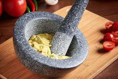 Mortar and pestle with guacamole.