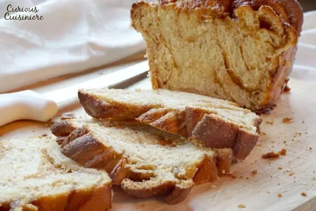 Tender and fluffy, and bursting with cinnamon flavor! Our Bread Machine Cinnamon Babka recipe makes this impressive, twisted sweet bread super easy to put together. | www.CuriousCuisiniere.com