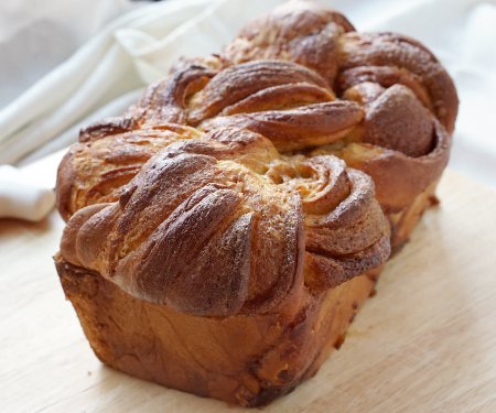 Tender and fluffy, and bursting with cinnamon flavor! Our Bread Machine Cinnamon Babka recipe makes this impressive, twisted sweet bread super easy to put together. | www.CuriousCuisiniere.com