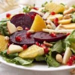 Ensalada Nochebuena is a bright and colorful Mexican Christmas Eve Salad full of seasonal vegetables and fruits. It's the perfect light and festive addition to your Christmas table!  | www.CuriousCuisiniere.com