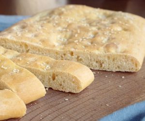 Lagana is a simple Greek flatbread that is traditionally eaten only once a year, on Clean Monday, the first day of Lent in the Greek Orthodox tradition.  | www.CuriousCuisiniere.com